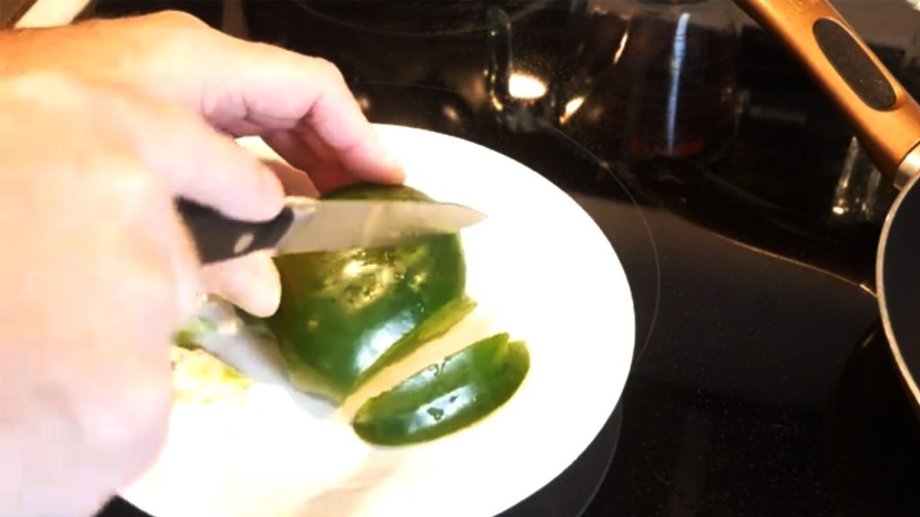 U Do It cutting up a green bell pepper with the Sabatier utility knife
