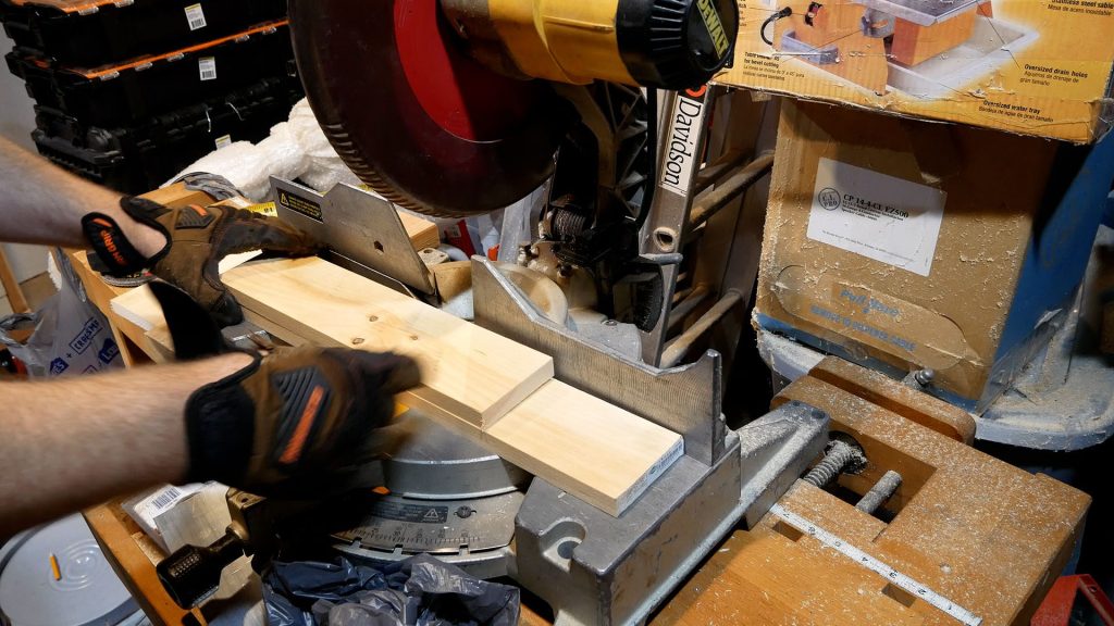 UDoIt cutting 1x4 pine boards for acoustic panel frame